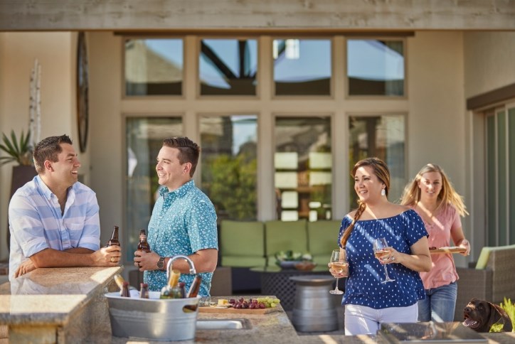 Young couples enjoying outdoor living in Elyson