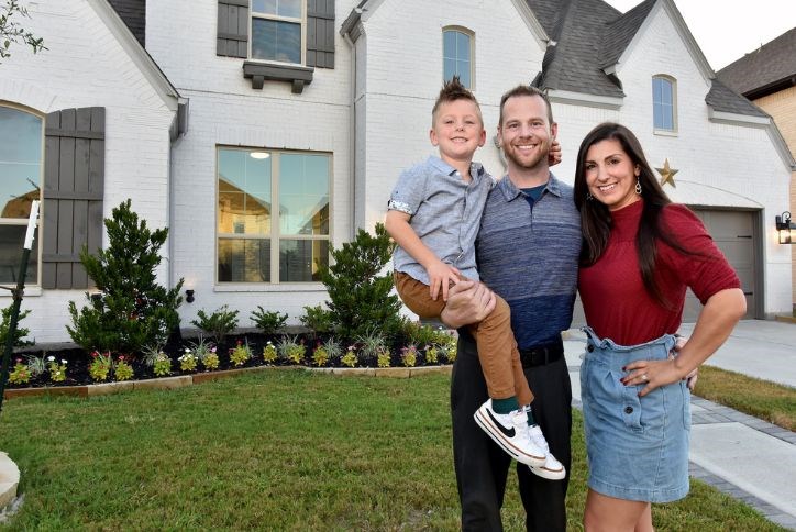 MacWilliams family in front of their Elyson home in Katy